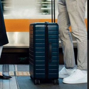 Away Travel *NEW* Navy Bigger Carryon w/ Battery